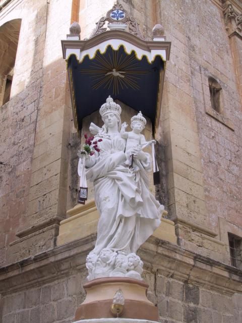 One of many madonna and child statues