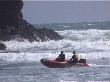 The sea and a boat at Piha